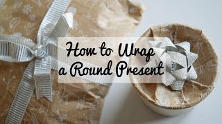 How to Wrap a Present Thats Round or Circular [upl. by Quinlan895]