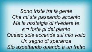 Andrea Bocelli  Lappuntamento Lyrics [upl. by Limaj]